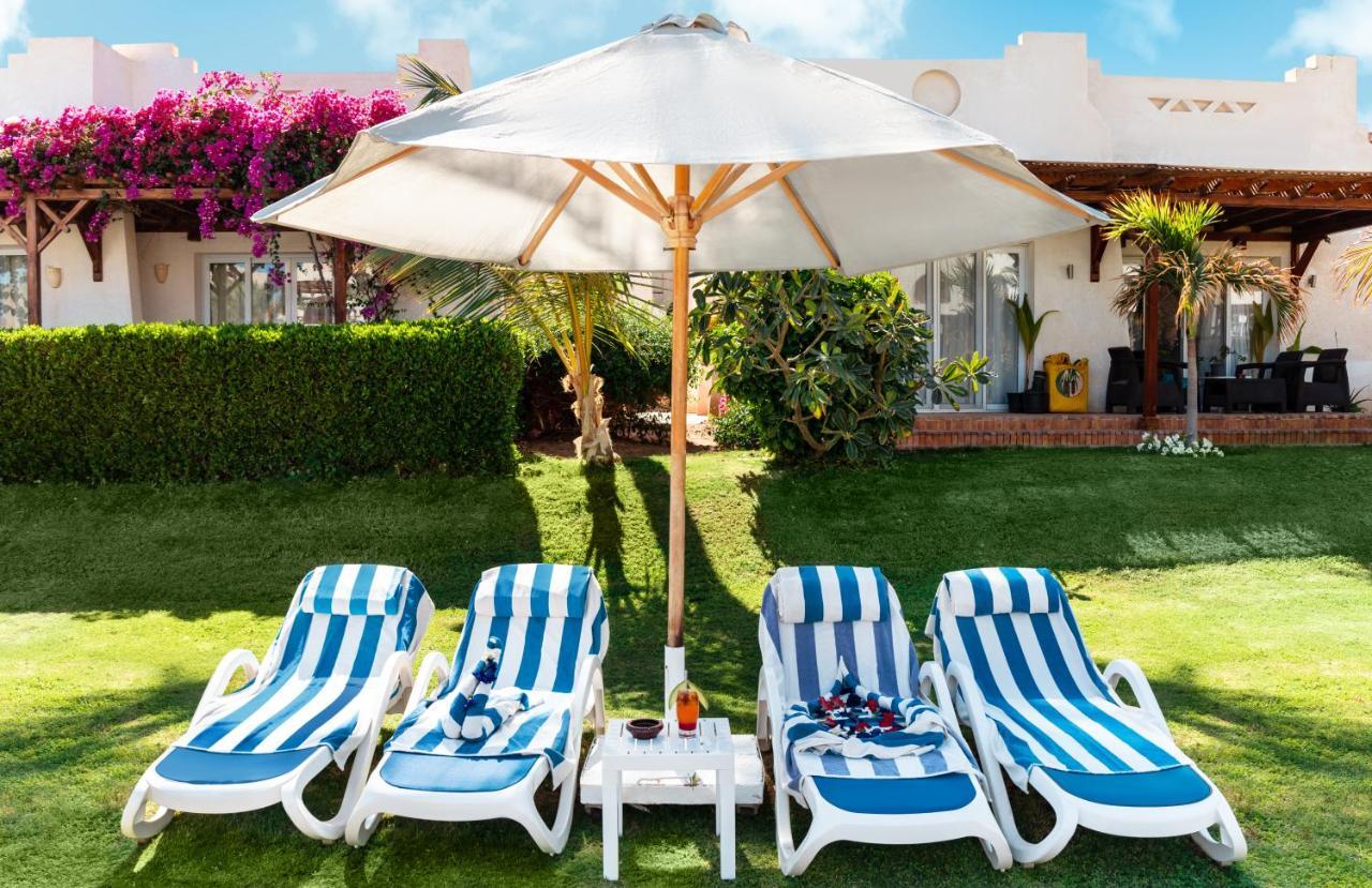 Sharm Dreams Vacation Club - Aqua Park Sharm El Sheikk Exterior foto A patio umbrella